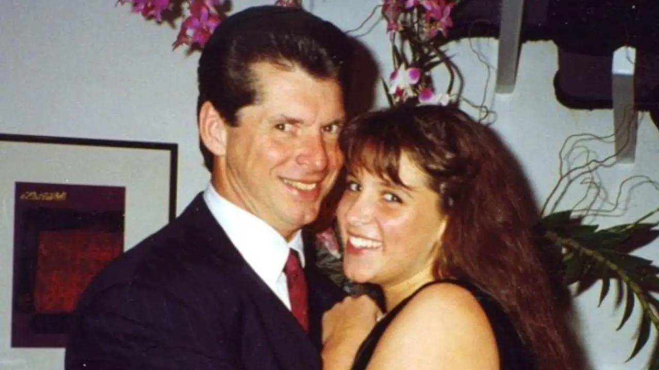 A young Stephanie McMahon with Vince McMahon in 1980s